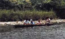 Fishing from dugout canoe