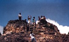 Locals on top of a pyramid